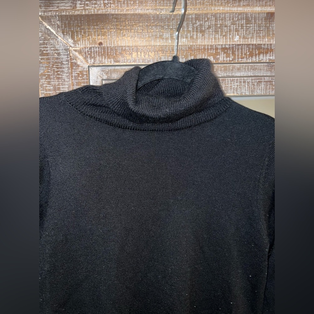 Black long sleeve turtleneck. Size L. Brand: Brave Soul London. 100% acrylic.